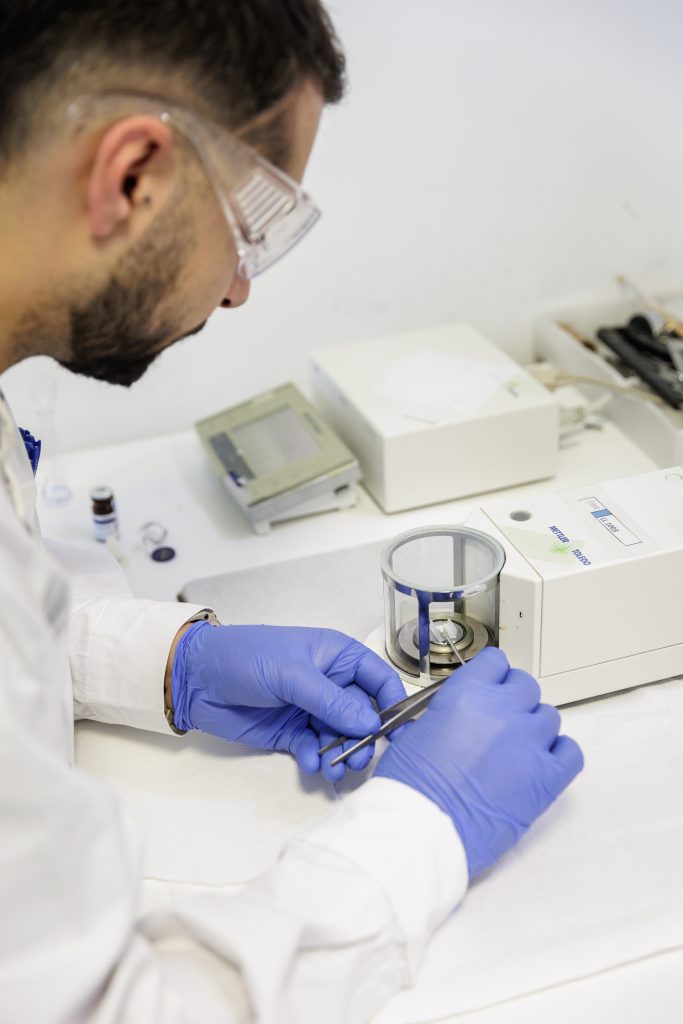 Image of a guy working at the development facility in Athens